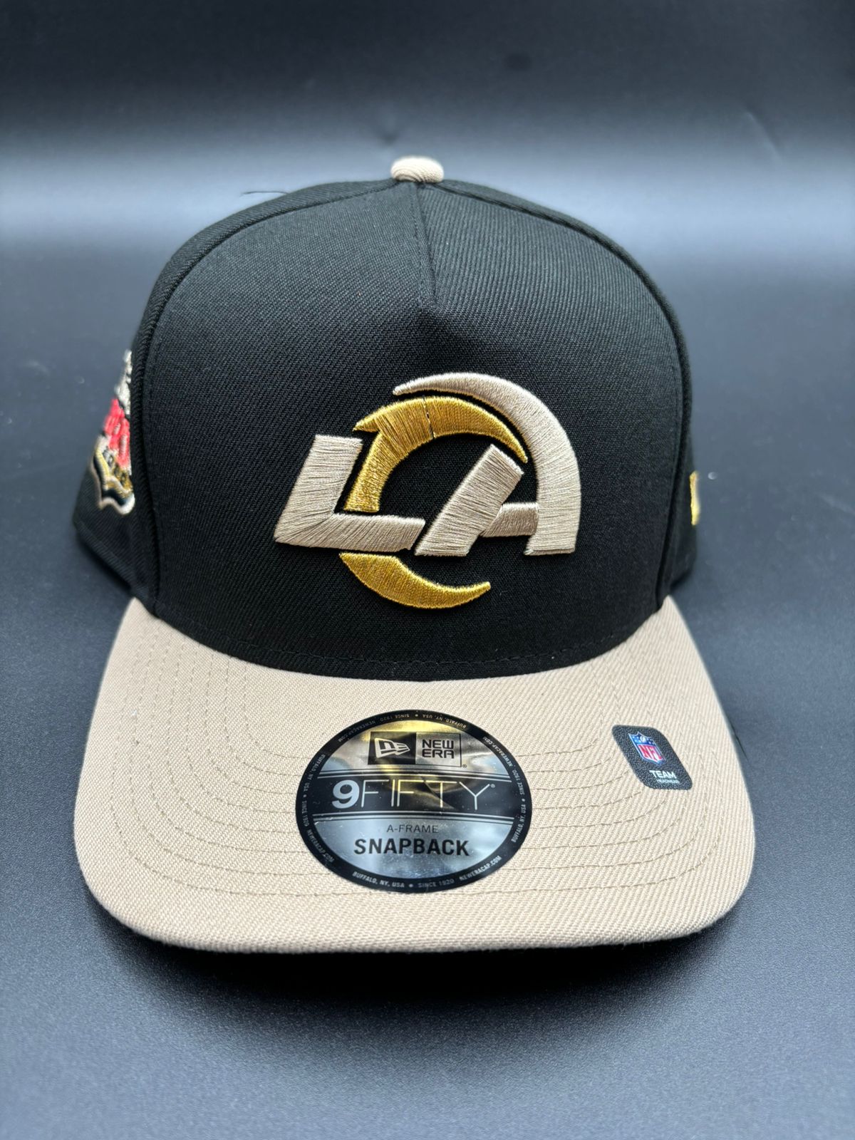 NEW ERA A-FRAME LA RAMS NEGRO CAFE