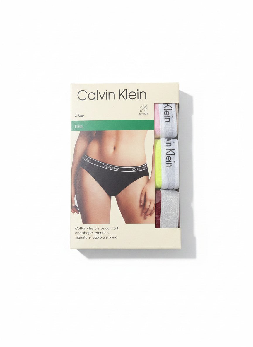 Pack de 3 braguitas bikini Calvin Klein de algodón elástico en negro, rosa, amarillo y burdeos con cinturilla de logo.