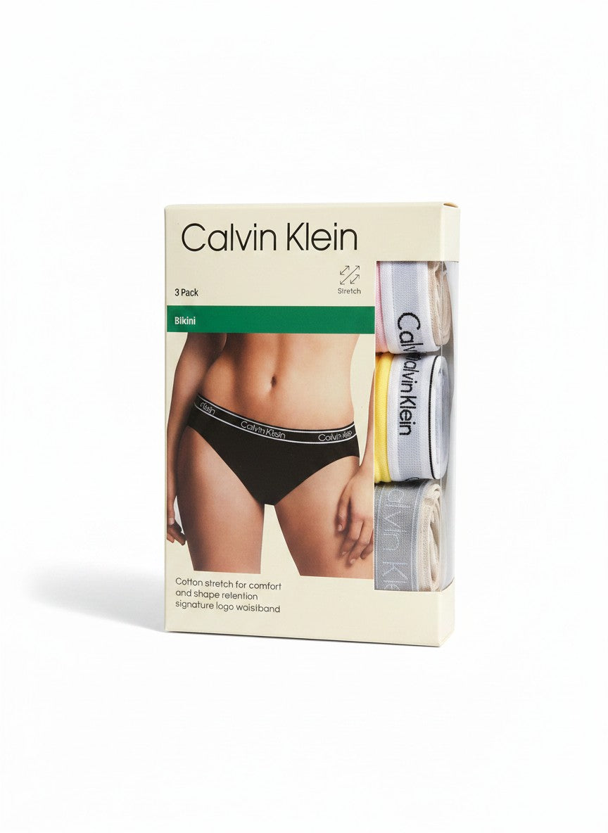 Pack de 3 braguitas bikini Calvin Klein de algodón elástico para mujer, pretina con logo, en negro, rosa, amarillo y gris.