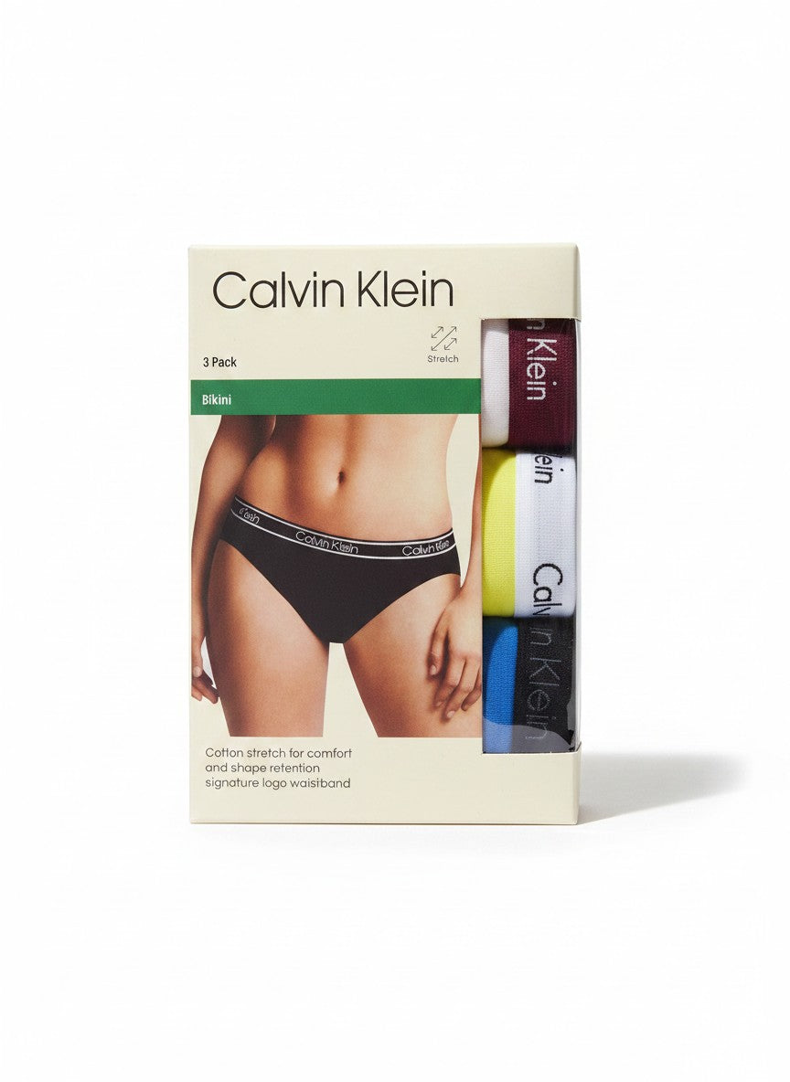 Pack de 3 braguitas bikini Calvin Klein para mujer, de algodón elástico, con cintura con logo. Colores: negro, blanco con amarillo, y azul.
