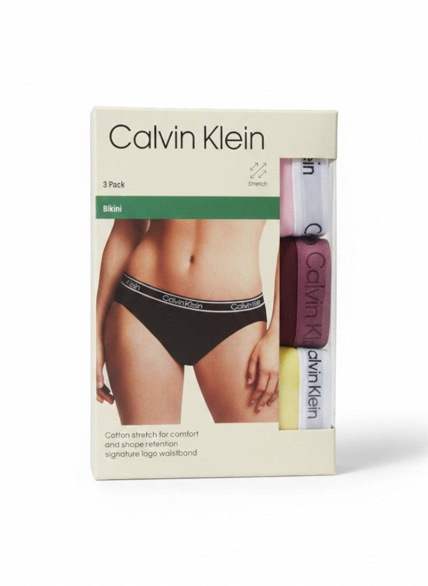 Pack de 3 braguitas bikini Calvin Klein de algodón elástico en colores rosa, morado y amarillo con cintura con logo.