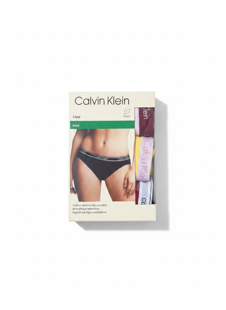 Pack de 3 braguitas bikini Calvin Klein de algodón elástico en colores burdeos, amarillo y azul claro con cinturilla de logo.