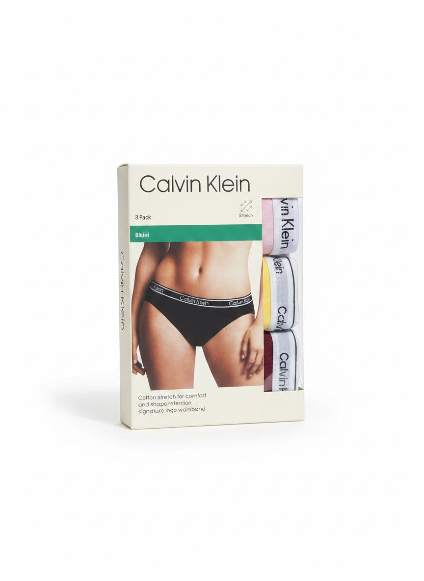 Pack de 3 braguitas bikini Calvin Klein de algodón elástico en negro, rosa, amarillo y burdeos con cinturilla de logo.