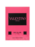 Elife Boutique VALENTINO BORN IN ROMA INTENSE Eau de Parfum para mujer, 3.4 oz. Caja rosa brillante con texto negro.